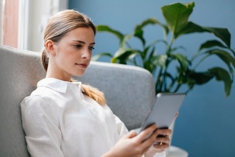 girl using electronic book